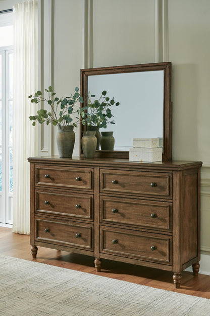 Sturlayne  Upholstered Panel Bed, Dresser, Mirror And Nightstand