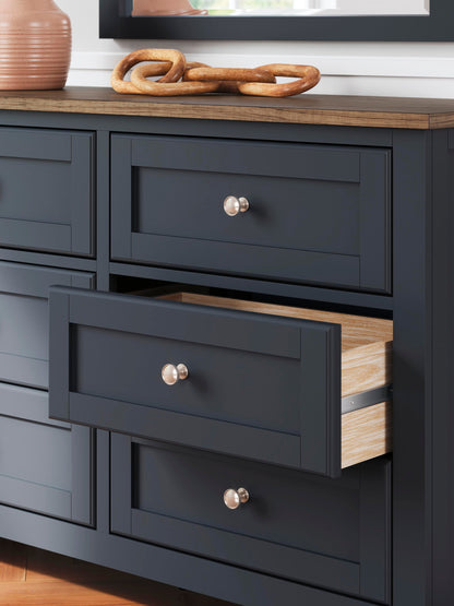 Landocken  Panel Bed, Dresser, Mirror And Nightstand